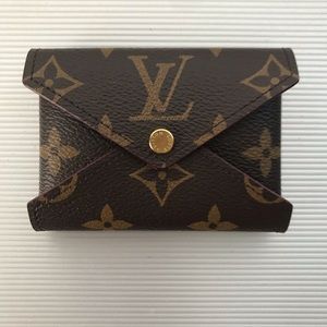 Louis Vuitton miniature kirigami coin purse. authentic.